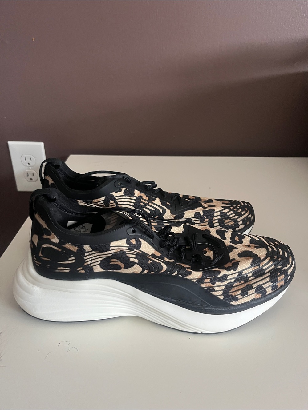 APL Women's Leopard Print Sneakers in Black and Tan